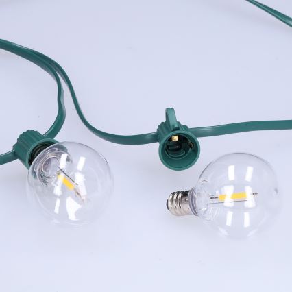 Brilagi - LED ulkokäyttöön tarkoitettu koristevalosarja GIRLANDA 25xE12/0,8W/230V 20m vihreä IP44 lämmin valkoinen