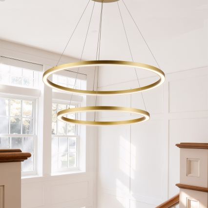 Brilagi - PORTOFINO LED-himmennettävä riippuvalaisin vaijerilla, 98 W / 230 V, 3000–6000 K, halkaisija 80 cm, kulta + kauko-ohjain