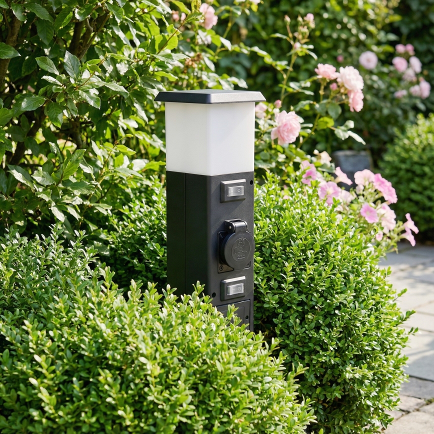 Brilagi - Ulkovalaisin, jossa 2 SCHUKO-pistorasiaa, 1xE14/15W/230V, IP44, musta