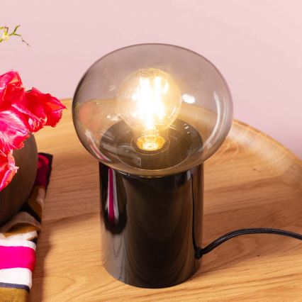 Brilliant - Pöytävalaisin KNUT 1xE27/25W/230V musta/läpinäkyvä