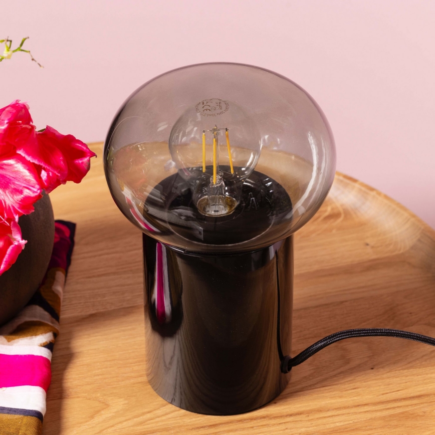 Brilliant - Pöytävalaisin KNUT 1xE27/25W/230V musta/läpinäkyvä