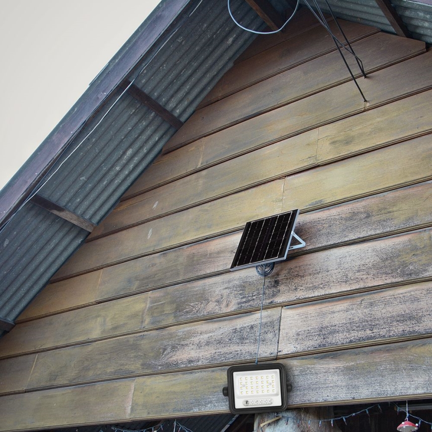 Himmennettävä LED-aurinkovalonheitin LED/50W/3,2V 2000-8000K IP65 3800 mAh musta + kauko-ohjain