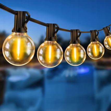 LED-himmennettävä ulkokoristevaloketju 25xE12/1W/24/230V 17,5 m IP65 musta + kaukosäädin