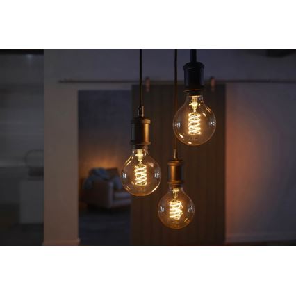 Himmennettevä LED-polttimo Philips Hue WHITE FILAMENT G93 E27/7W/230V 2100K