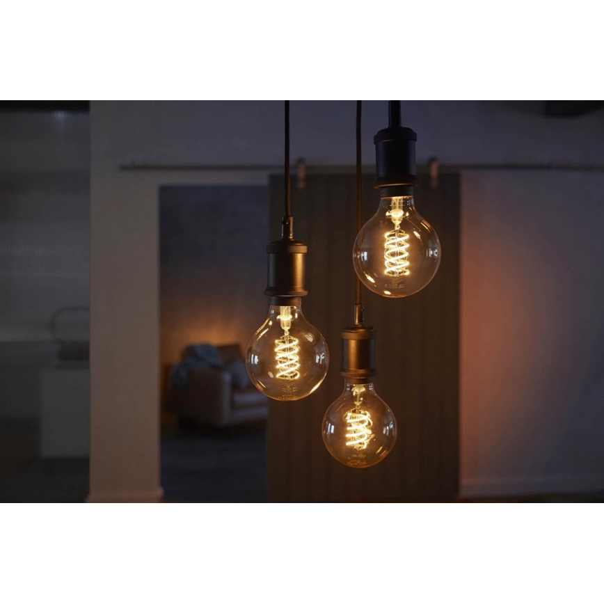 Himmennettevä LED-polttimo Philips Hue WHITE FILAMENT G93 E27/7W/230V 2100K