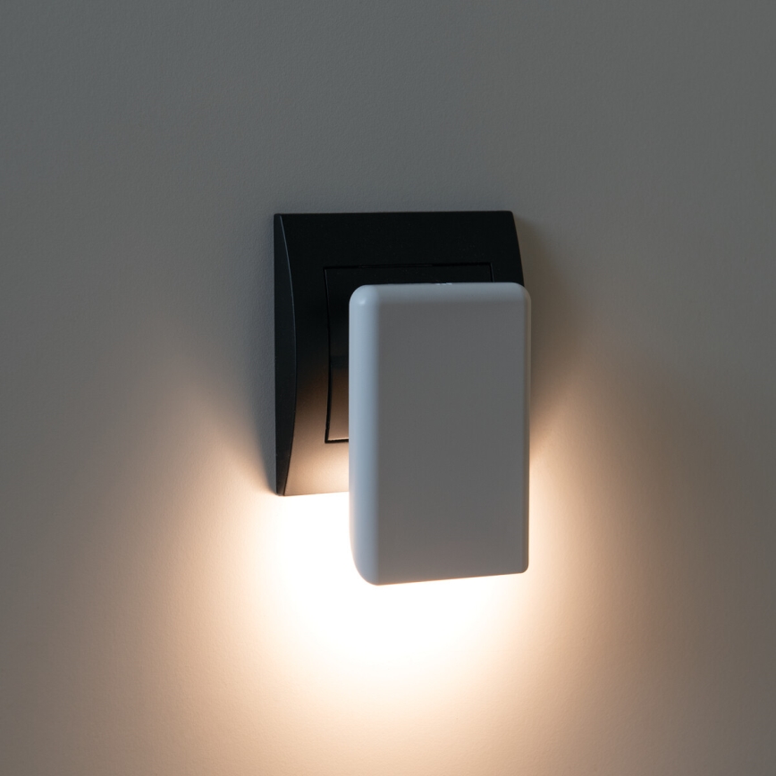 LED-opastevalaisin hämäräkytkimellä pistorasiaan ORISA LED/0,28W/230V valkoinen