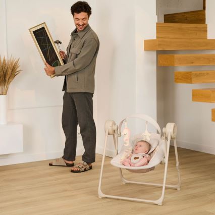 KINDERKRAFT - Lasten keinu melodialla SWINGEE beige 4xAAA/230V