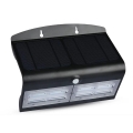 LED aurinkokenno seinävalaisin anturilla LED/7W/3,7V 4000K IP65 musta