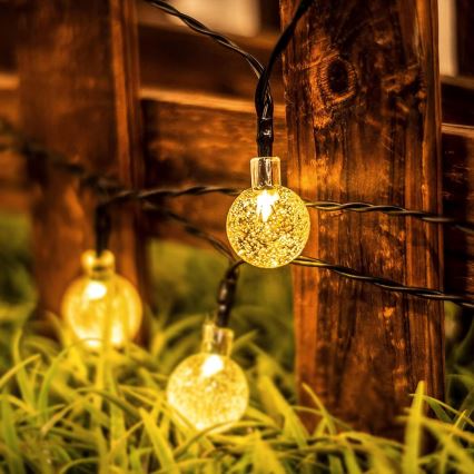 LED-aurinkokennolla toimiva koristevaloketju 30 LED/8 toimintoa 500 mAh 6,5 m IP67 lämmin valkoinen