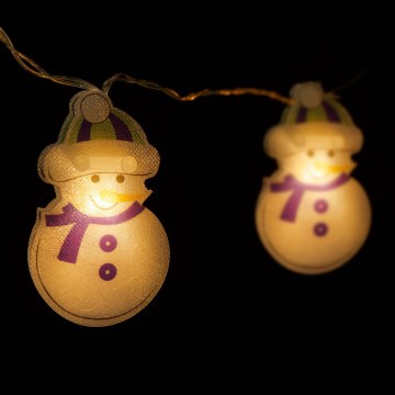 LED-jouluketju 10xLED/2xAA 1,35 m lämmin valkoinen lumiukko