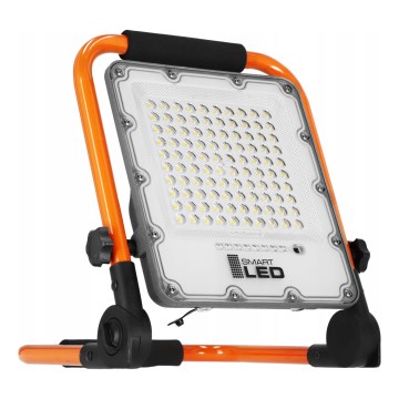 LED Ladattava heittovalo jalustalla LED/50W/3,2V 4500K 10000 mAh IP65 oranssi