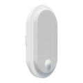 LED Ulkoseinävalaisin liike- ja hämäräanturilla OVAL LED/10W/230V IP65 valkoinen