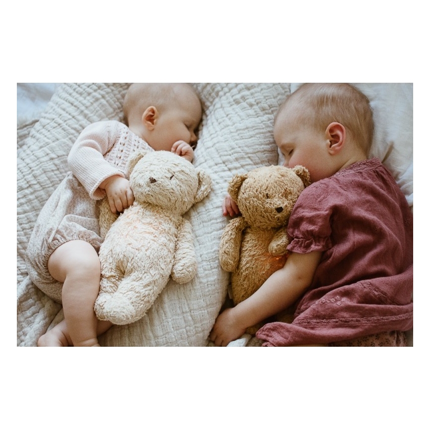 Moonie - Snuggle buddy melodialla ja valolla pieni karhu organic caramel natur