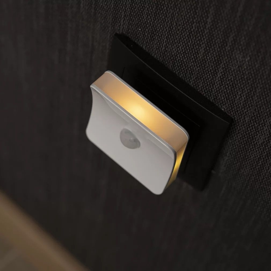 Osram - RGB-LED pistorasiaan kytkettävä yövalo anturilla LUNETTA LED/0,3W/230V