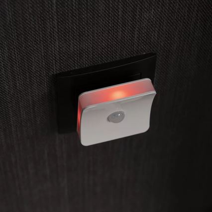 Osram - RGB-LED pistorasiaan kytkettävä yövalo anturilla LUNETTA LED/0,3W/230V