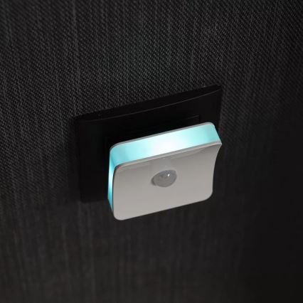 Osram - RGB-LED pistorasiaan kytkettävä yövalo anturilla LUNETTA LED/0,3W/230V