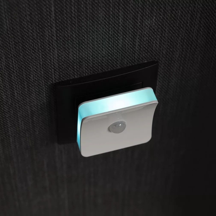 Osram - RGB-LED pistorasiaan kytkettävä yövalo anturilla LUNETTA LED/0,3W/230V