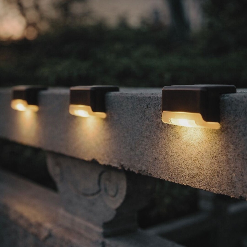 Rabalux - 4 kpl LED-aurinkoseinävalaisinta hämäräkytkimellä LED/0,06W/1,2V 300 mAh IP44