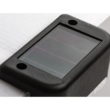 Rabalux - 4 kpl LED-aurinkoseinävalaisinta hämäräkytkimellä LED/0,06W/1,2V 300 mAh IP44