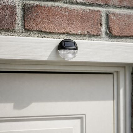 Rabalux - 2 kpl LED-aurinkoseinävalaisinta LED/0,06W/1,2V 300 mAh IP44