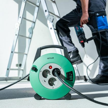 Retlux - kelallinen jatkojohto, 3 pistorasiaa, Tyyppi E, 10 m, vihreä/musta