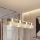 Ripustettava kattovalaisin LUX 4xE27/15W/230V valkoinen/kultainen