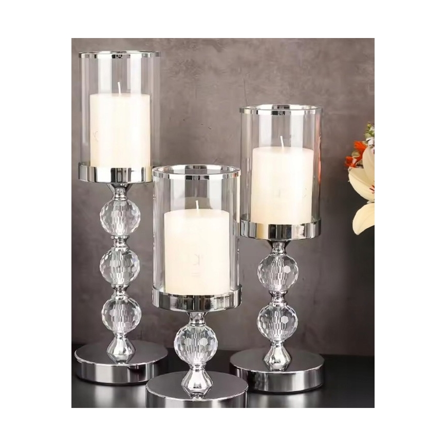 Setti 3 kpl kiiltäviä kromisia kynttilänjalkoja