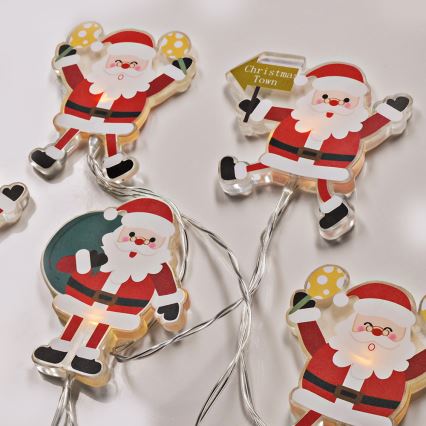 LED jouluketju imukupeilla 6xLED/2xAA 1,2m lämmin valkoinen joulupukki