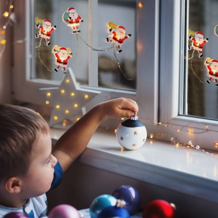 LED-valoketju imukuppeilla 6xLED/2xAA 1,2m lämmin valkoinen Joulupukki