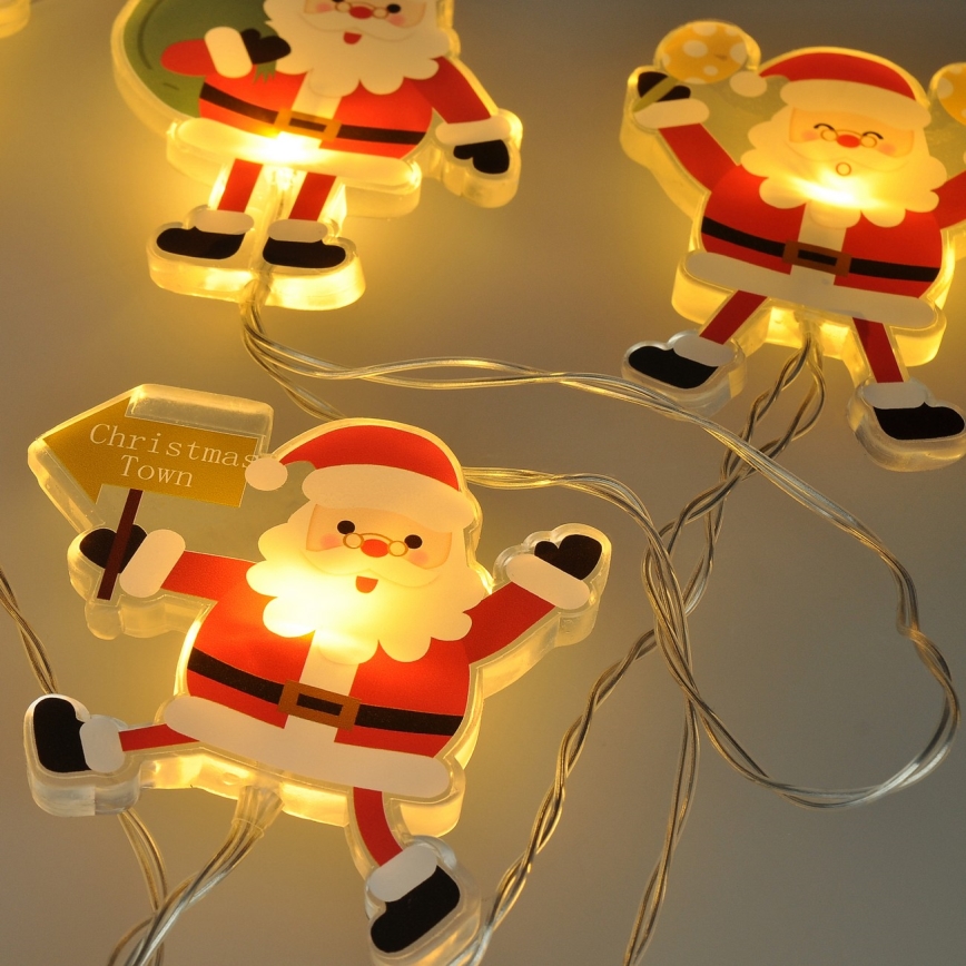 LED-valoketju imukuppeilla 6xLED/2xAA 1,2m lämmin valkoinen Joulupukki