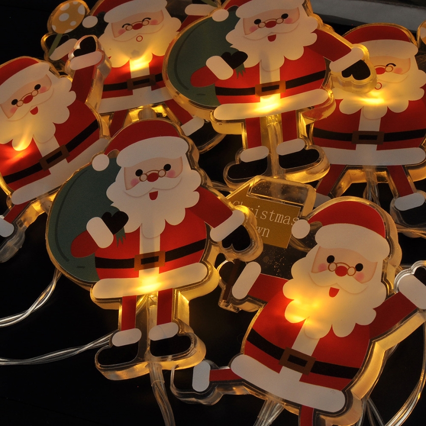 LED-valoketju imukuppeilla 6xLED/2xAA 1,2m lämmin valkoinen Joulupukki