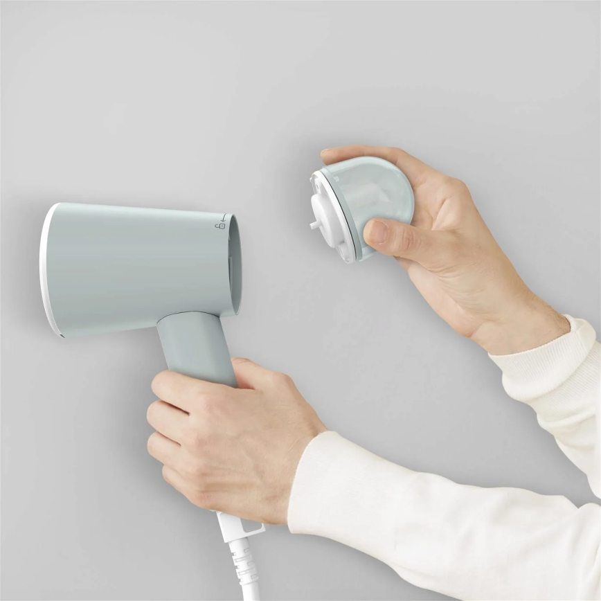 Tefal - Kädessä pidettävä vaatteiden höyrystin ORIGIN TRAVEL vihreä