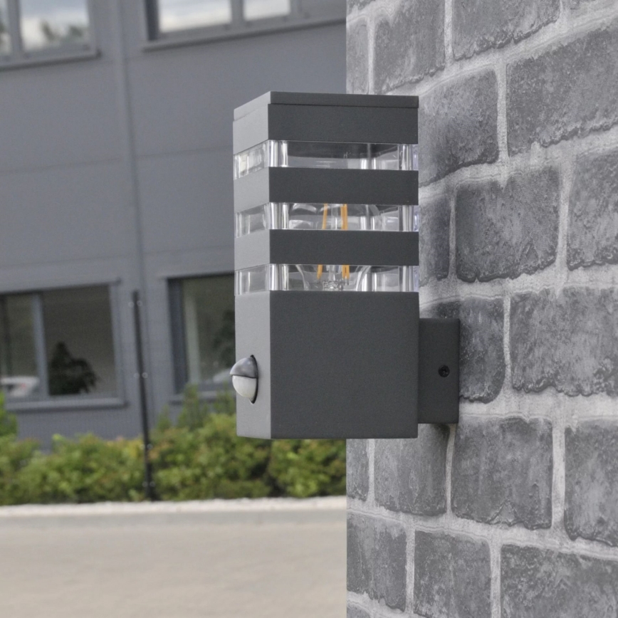 Ulkoseinävalaisin anturilla TEKSAS 1xE27/12W/230V IP44 antrasiitti