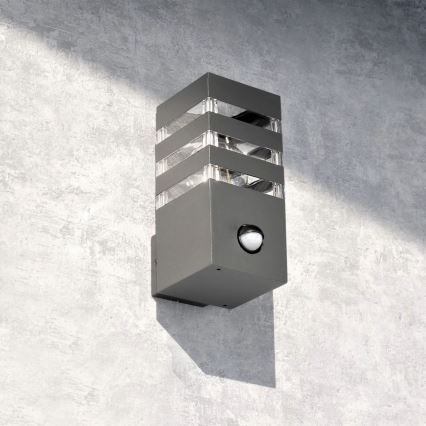 Ulkoseinävalaisin anturilla TEKSAS 1xE27/12W/230V IP44 antrasiitti